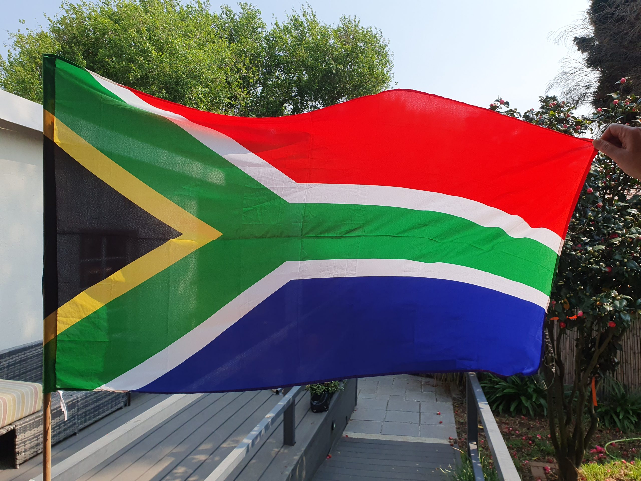 South African polyester flag, 145 cm wide and 90 cm high, displayed outdoors